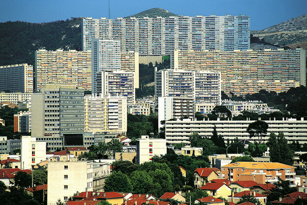 A cityscape of Marseille with large skyscraper blocks
