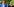 Henrik Wüst und Mona Neubauer lachen vor Pflanzen