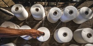 FAdenspulen, die bei der Herstellung von textilien verwendet werden