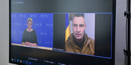 Videos von Giffey und dem vermeintlichen Klitschko sind auf einem Bildschirm bei einem Webex-Meeting zu sehen. Der Bildschirm wurde abfotografiert.
