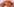 eine orangfarbene Schachtel, in der sich Abtreibungspillen befinden