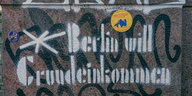 Graffiti an einer Wand. Dort steht: Berlin will Grundeinkommen