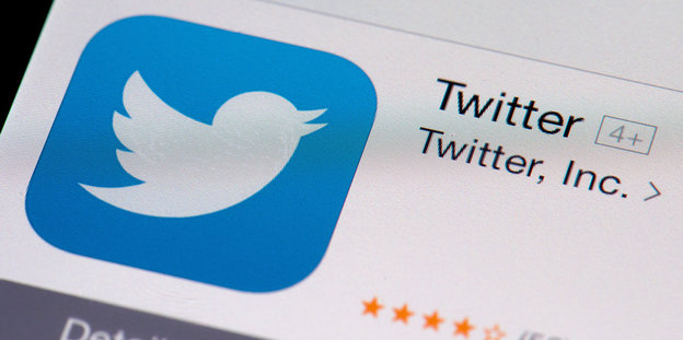 Twitter-Logo, weißes Vögelchen von hellblauem Hintergrund