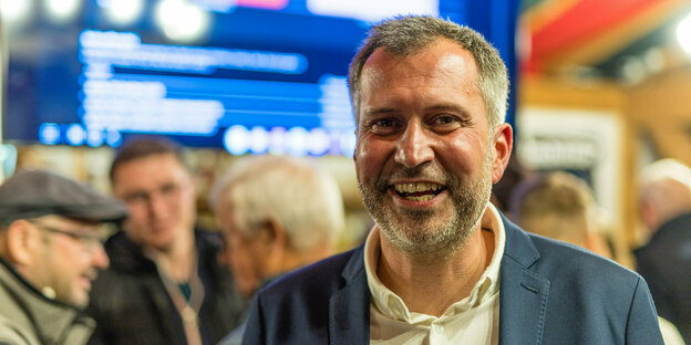 Der SPD-Kandidat lächelnd