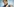 Bundesgesundheitsminister Karl Lauterbach entfernt seine Mundschutzmaske