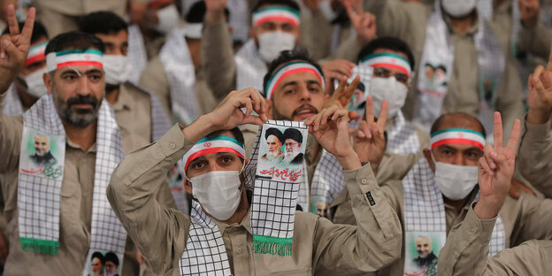 Iranian militia members at a gathering.