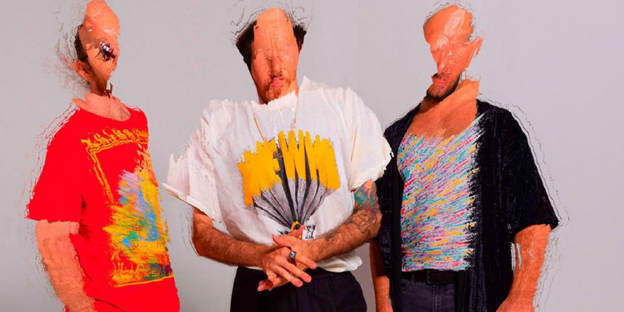 Three people with deformed faces and colorful clothes look at the camera