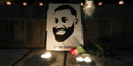 Ein Foto und Toten- Lichte im Gedenken an den getöteten Sedat Gürbüz