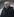Ein mittelalter Mann vor grauem Hintergrund