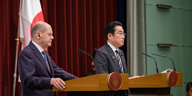 Das Bild zeigt Kanzler Olaf Scholz uns seinen japanischen Amtskollegen