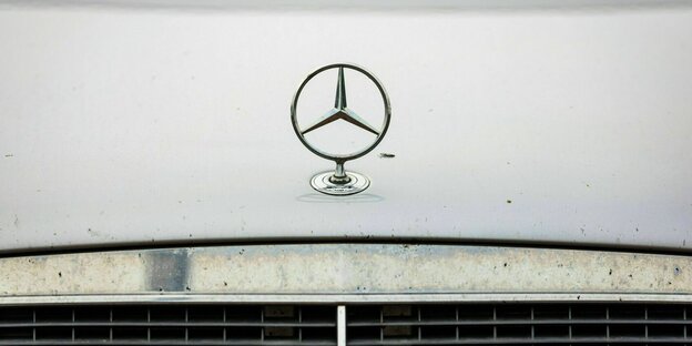 A Mercedes star is emblazoned on a radiator hood