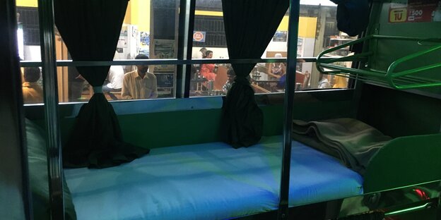The sleeping cabin in an Indian night bus