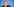 Patrick Graichen hat dunkelblonde Locken, trägt Brille und Anzug und schaut skeptisch in die Höhe