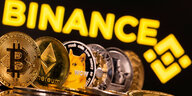 Kryptowährungen vor Binance-Logo