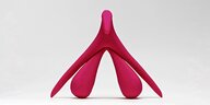 Ein pinkfarbenes Modell der Klitoris