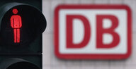 Bahn-Logo neben roter Fußgängerampel