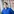 Person mit Brille und blauer Bluse