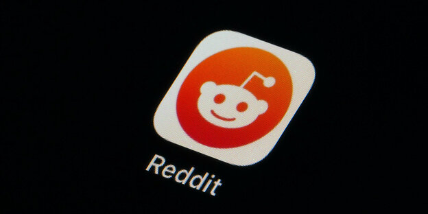 Reddit Logo. Der Kopf eines süßen Roboters auf orangem Hintergrund.