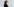Eine Puppe, der Künstlerin Louisa Clement nachempfunden, mit langen, welligen und braunen Haaren