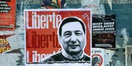 Ein politisches Plakat, mit dem Portät von Boris Kagarlitsky und dem Wort Liberte/Freitheit