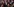 Teilnehmer und Teilnehmerinnen einer Klimakonferenz, eine Frau (in der Bildmitte) schaut sehr gespannt und trägt Kopfhörer