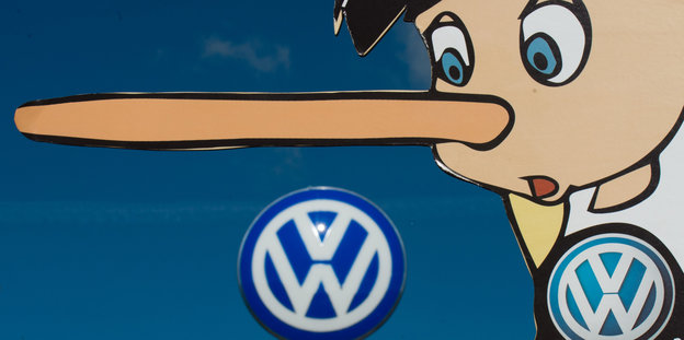 Pinocchio mit langer Nase über VW-Logo