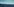 Zu sehen sind Photovoltaikanlagen. Im Hintergrund ein Windrad und blauer Himmel