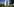 Das Foto zeigt ein Hochhaus, das schief zu stehen scheint.
