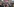 Viele Menschen stehen mit Schildern auf einer Demonstration gegen rechts