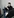 Johannes Winkel mit schwarzem 3-Tage-Bart und Quarterzip-Hoodie