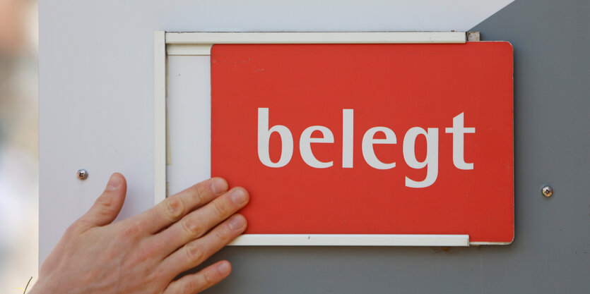 Schild mit der Aufschrift "belegt"