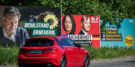 Das Foto zeigt ein Europawahlplakat der Grünen mit Robert Habeck neben Plakaten von SPD und CDU.