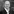 Portrait Norbert Schäffer vor den Blättern eines Baumes