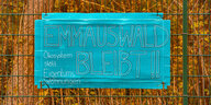 Schild an Zaun "Emmauswald bleibt!"