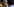 Ein Mann mit erstauntem Blick ist im Blick zu sehen