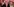 Keir Starmer, ein Mann im Anzug mit roter Krawatte und schwarzer Hornbrille, winkt ins Publikum von einem Sprecherpodium