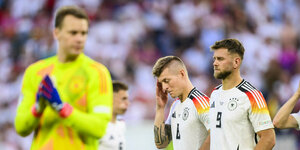 Enttäuschte deutsche Fußballnationalspieler