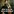 Julio Iglesias lächelnd in einer adligen Uniform aus dem 18. Jahrhundert, in seiner linken Hand ein Degen. Das Meme hat die Optik eines alten Gemäldes. Unten der Text "éste ya es un Julio histórico"/ Dies ist bereits ein historischer Juli.