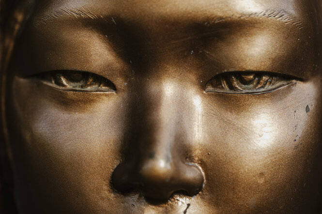 Augen einer Bronzestatue