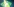 Ein Lichtstrahl auf einem im Boden eingelassenes Logo einer E-Ladesäule