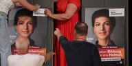 Menschen hantieren an Plakaten mit dem Portrait Sarah Wagenknechts