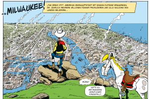 Lucky Luke steht auf einem Berg und schaut auf 