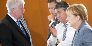 Seehofer, Gabriel und Merkel im Gespräch.