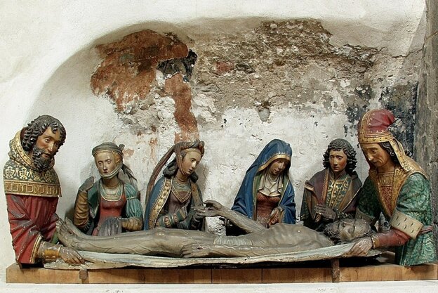 Grablegungsgruppe von 15o9 in einer Nische neben dem Taufbecken von Groß St. Martin, Köln. Von links nach rechts: Nikodemus, unbekannte Helferin, Maria Magdalena, Maria, Johannes, Josef von Arimathäa; Nikodemus und Josef von Arimathäa sind durch hebräisch
