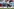 Lars Barlemann steht gestikulierend vor Werbebanden am Spielfeldrand