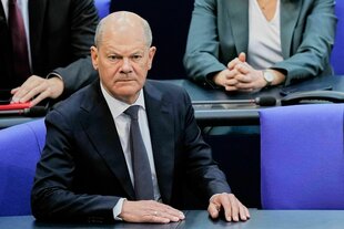Olaf Scholz mit schockierter Mimik