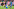 Trainer hilft Spieler hoch und klatscht einen anderen ab