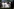 Menschen halten ein Transparent mit dem Bild von Oury Jalloh während einer Demonstration gegen Polizeibrutalität und Rassenungleichheit nach dem Tod von George Floyd im Polizeigewahrsam von Minneapolis in Dessau, Deutschland, 11. Juni 2020