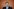 KLingbeil sitzt mit neutral-abwesendem Gesichtsausdruck in einer Pressekonferenz