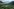 Eine Flusslandschaft mit Gebirge im Hintergrund Eine Flusslandschaft mit Gebirge im Hintergrund